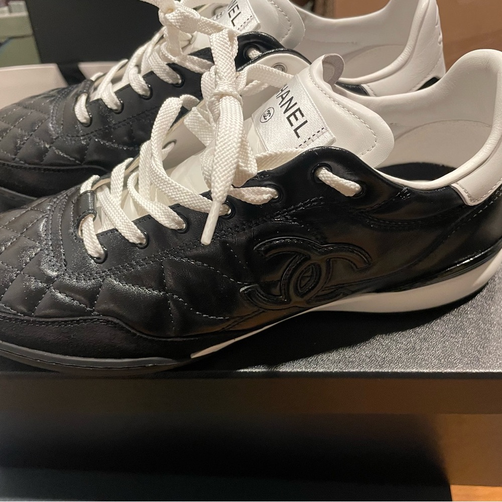 Worn once, Blk on blk Chanel sneakers size 38.5, comes with box and extra laces